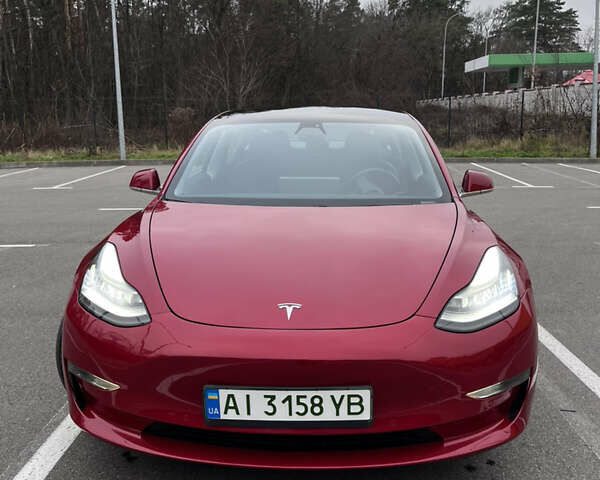 Красный Тесла Модель 3, объемом двигателя 0 л и пробегом 77 тыс. км за 17000 $, фото 2 на Automoto.ua