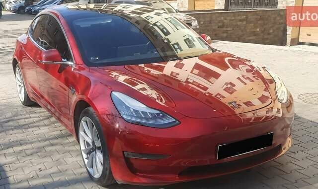 Красный Тесла Модель 3, объемом двигателя 0 л и пробегом 158 тыс. км за 15951 $, фото 5 на Automoto.ua