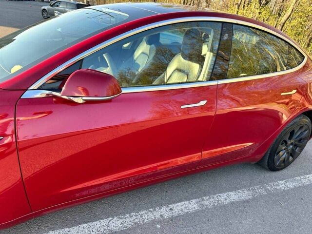 Тесла Модель 3 2019 в Днепре (Днепропетровске) на Automoto.ua Красный Тесла Модель 3, объемом двигателя 0 л и пробегом 112 тыс. км за 17899 $, фото 8 на Automoto.ua