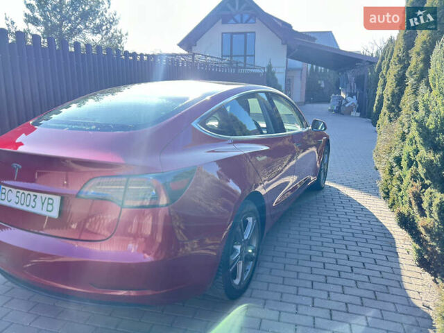 Красный Тесла Модель 3, объемом двигателя 0 л и пробегом 82 тыс. км за 15500 $, фото 3 на Automoto.ua