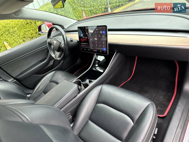 Красный Тесла Модель 3, объемом двигателя 0 л и пробегом 121 тыс. км за 24900 $, фото 45 на Automoto.ua