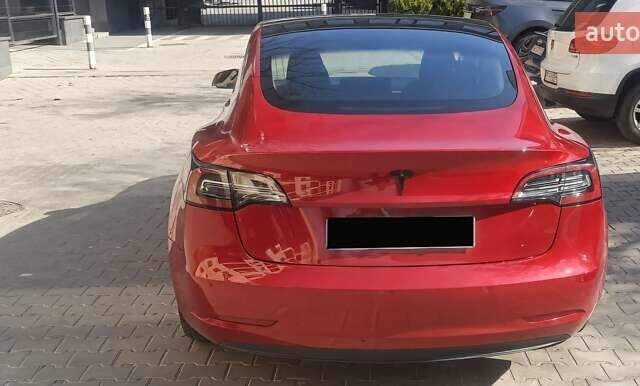 Красный Тесла Модель 3, объемом двигателя 0 л и пробегом 158 тыс. км за 15951 $, фото 3 на Automoto.ua