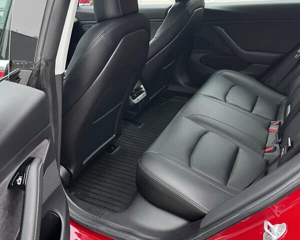 Красный Тесла Модель 3, объемом двигателя 0 л и пробегом 77 тыс. км за 17000 $, фото 15 на Automoto.ua