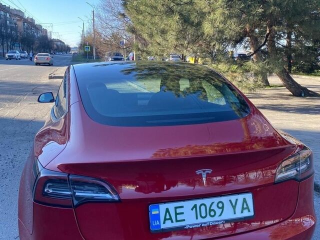 Красный Тесла Модель 3, объемом двигателя 0 л и пробегом 54 тыс. км за 17000 $, фото 1 на Automoto.ua