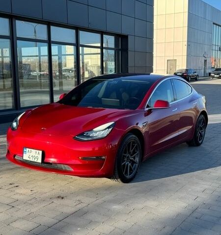 Красный Тесла Модель 3, объемом двигателя 0 л и пробегом 164 тыс. км за 15500 $, фото 1 на Automoto.ua
