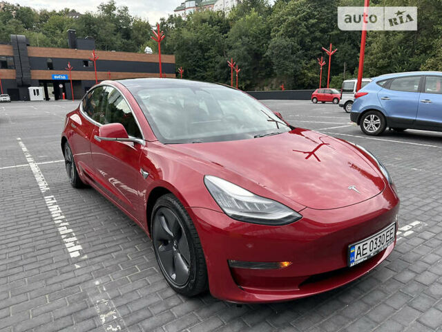 Красный Тесла Модель 3, объемом двигателя 0 л и пробегом 82 тыс. км за 23000 $, фото 2 на Automoto.ua