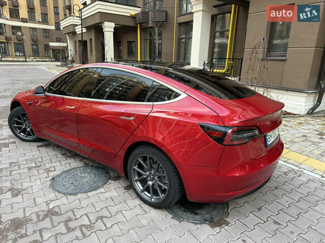 Красный Тесла Модель 3, объемом двигателя 0 л и пробегом 102 тыс. км за 19100 $, фото 2 на Automoto.ua