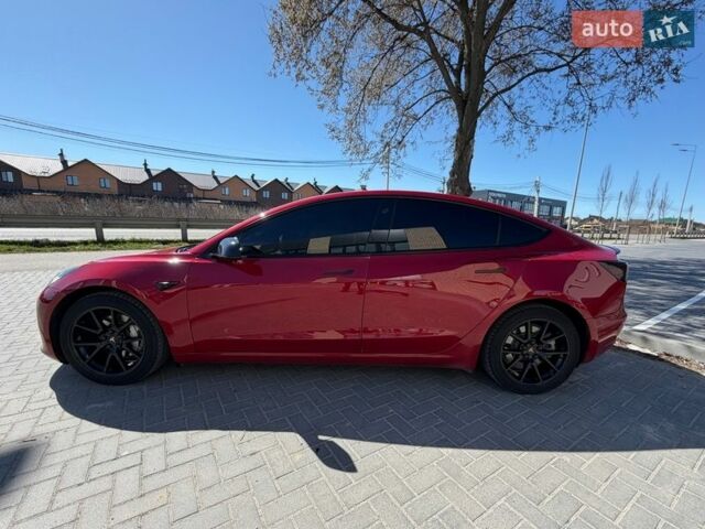 Красный Тесла Модель 3, объемом двигателя 0 л и пробегом 91 тыс. км за 20900 $, фото 1 на Automoto.ua