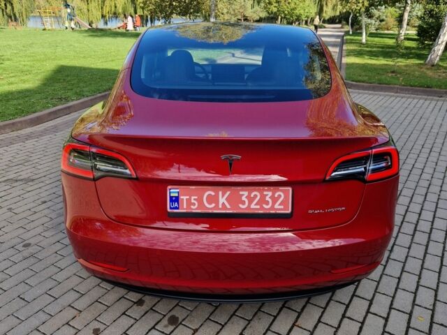 Красный Тесла Модель 3, объемом двигателя 0 л и пробегом 64 тыс. км за 23000 $, фото 3 на Automoto.ua