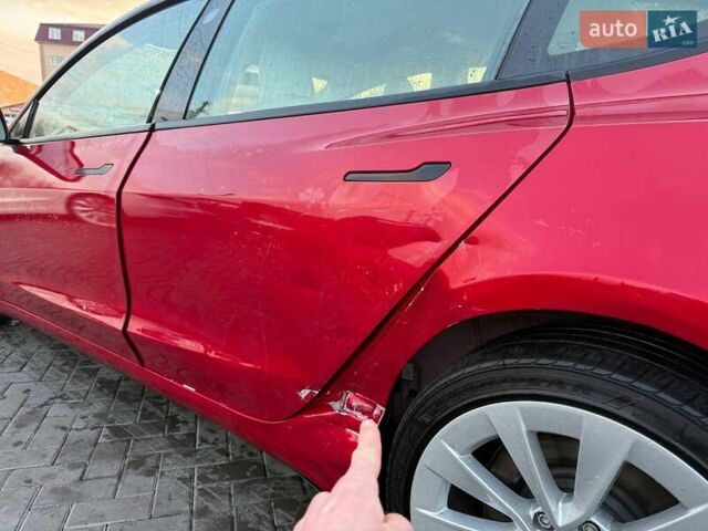 Красный Тесла Модель 3, объемом двигателя 0 л и пробегом 187 тыс. км за 13600 $, фото 1 на Automoto.ua