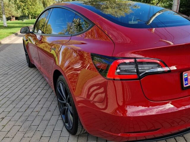 Красный Тесла Модель 3, объемом двигателя 0 л и пробегом 64 тыс. км за 23000 $, фото 2 на Automoto.ua