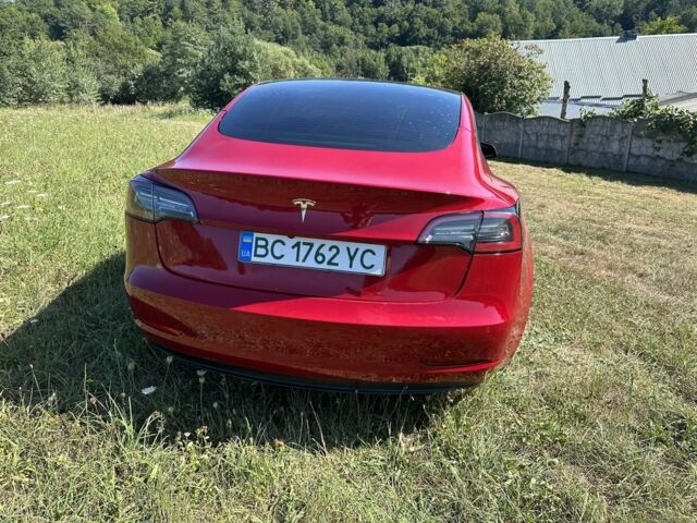 Красный Тесла Модель 3, объемом двигателя 0 л и пробегом 121 тыс. км за 19671 $, фото 4 на Automoto.ua