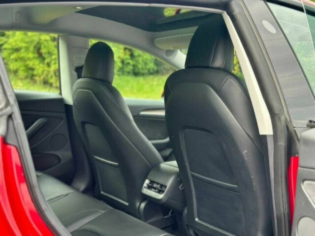 Красный Тесла Модель 3, объемом двигателя 0 л и пробегом 23 тыс. км за 10000 $, фото 11 на Automoto.ua