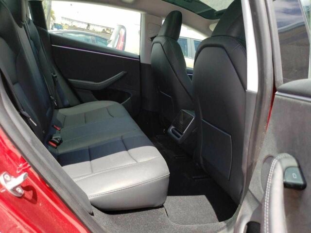 Красный Тесла Модель 3, объемом двигателя 0 л и пробегом 11 тыс. км за 24500 $, фото 8 на Automoto.ua