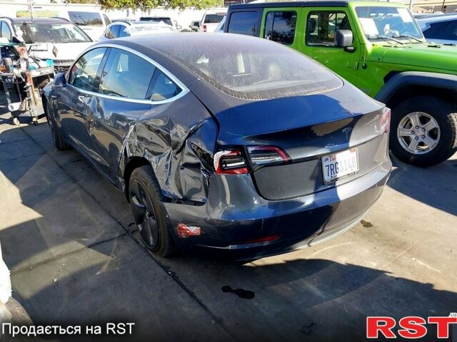 Серый Тесла Модель 3, объемом двигателя 0.28 л и пробегом 107 тыс. км за 11600 $, фото 3 на Automoto.ua