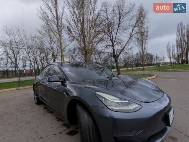 Серый Тесла Модель 3, объемом двигателя 0 л и пробегом 245 тыс. км за 15689 $, фото 1 на Automoto.ua