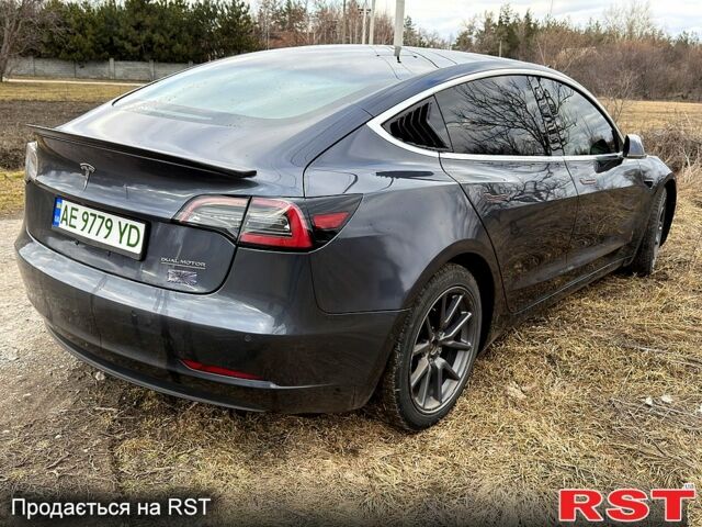 Серый Тесла Модель 3, объемом двигателя 0.2 л и пробегом 114 тыс. км за 15500 $, фото 3 на Automoto.ua