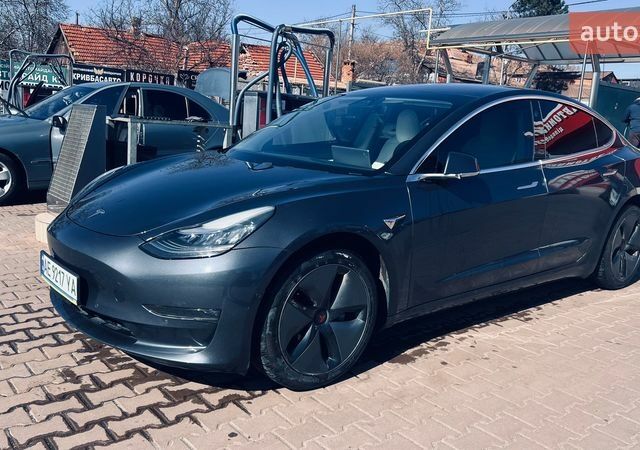 Серый Тесла Модель 3, объемом двигателя 0 л и пробегом 148 тыс. км за 17300 $, фото 4 на Automoto.ua