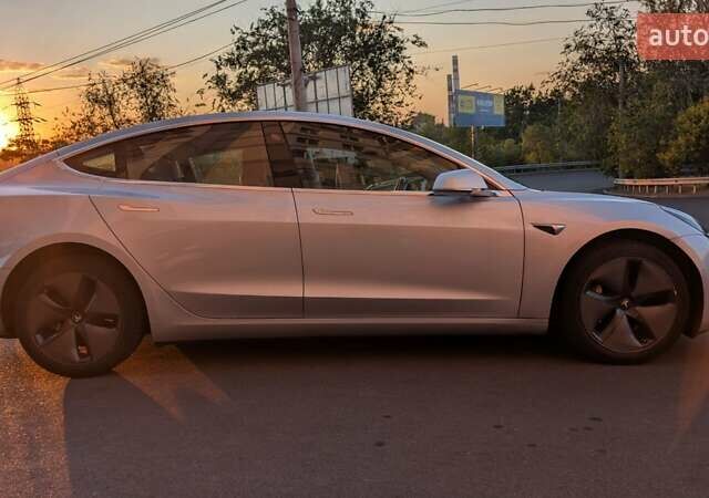 Серый Тесла Модель 3, объемом двигателя 0 л и пробегом 91 тыс. км за 16900 $, фото 2 на Automoto.ua