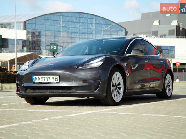 Серый Тесла Модель 3, объемом двигателя 0 л и пробегом 65 тыс. км за 23000 $, фото 1 на Automoto.ua