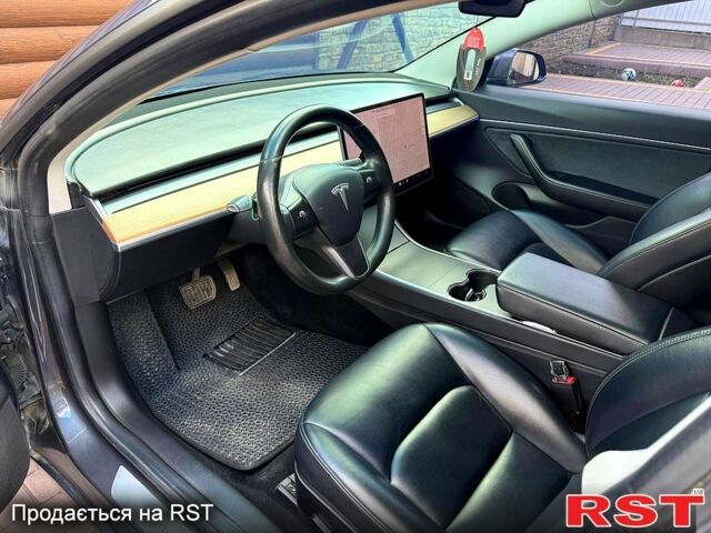 Серый Тесла Модель 3, объемом двигателя 0.23 л и пробегом 119 тыс. км за 15300 $, фото 9 на Automoto.ua