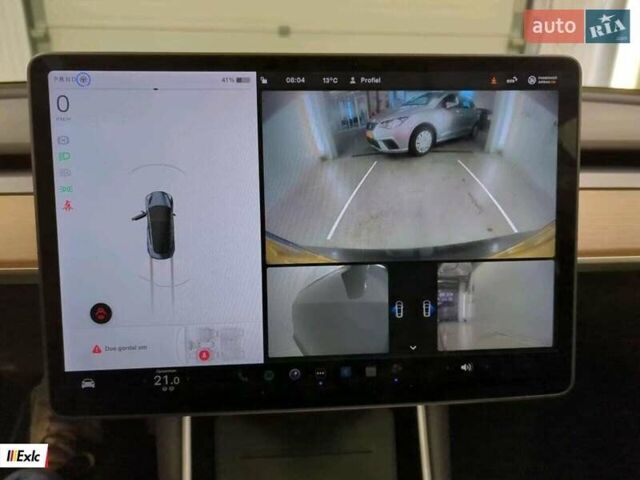 Серый Тесла Модель 3, объемом двигателя 0 л и пробегом 124 тыс. км за 20600 $, фото 14 на Automoto.ua