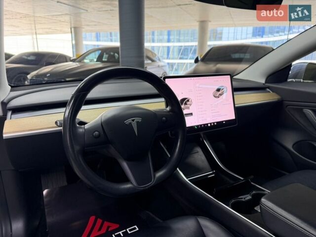 Серый Тесла Модель 3, объемом двигателя 0 л и пробегом 56 тыс. км за 16900 $, фото 25 на Automoto.ua