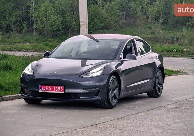 Серый Тесла Модель 3, объемом двигателя 0 л и пробегом 124 тыс. км за 20600 $, фото 4 на Automoto.ua