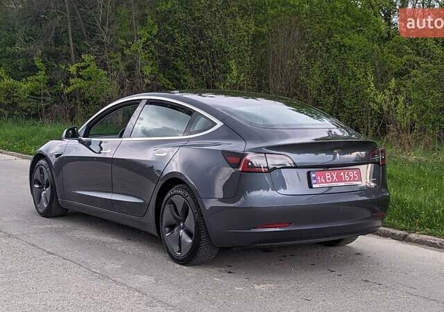 Серый Тесла Модель 3, объемом двигателя 0 л и пробегом 124 тыс. км за 20600 $, фото 5 на Automoto.ua