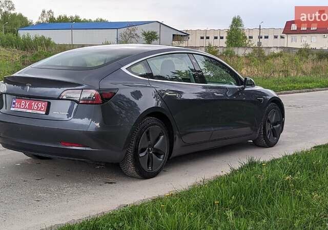 Серый Тесла Модель 3, объемом двигателя 0 л и пробегом 124 тыс. км за 20600 $, фото 6 на Automoto.ua