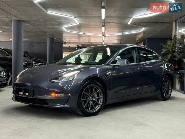Серый Тесла Модель 3, объемом двигателя 0 л и пробегом 56 тыс. км за 16900 $, фото 6 на Automoto.ua