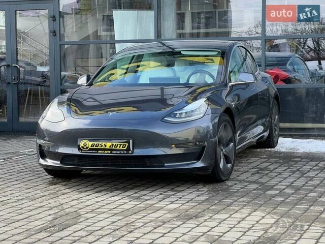 Серый Тесла Модель 3, объемом двигателя 0 л и пробегом 88 тыс. км за 22900 $, фото 2 на Automoto.ua