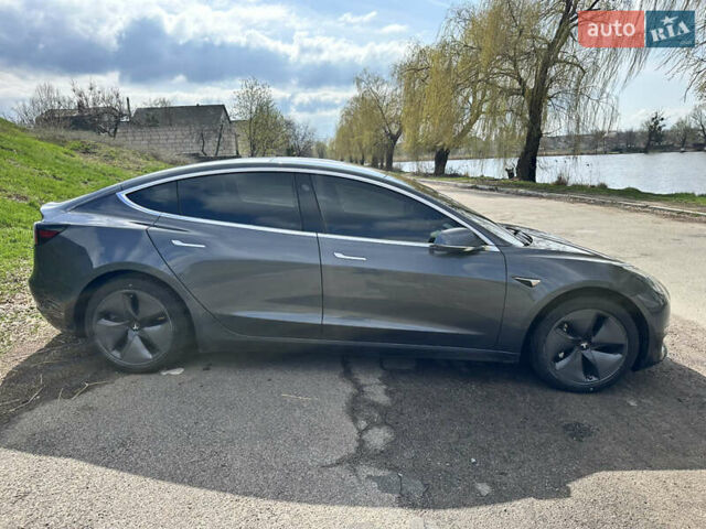 Серый Тесла Модель 3, объемом двигателя 0 л и пробегом 130 тыс. км за 15200 $, фото 6 на Automoto.ua