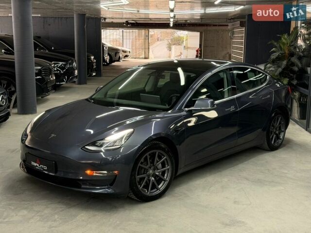 Серый Тесла Модель 3, объемом двигателя 0 л и пробегом 56 тыс. км за 16900 $, фото 5 на Automoto.ua