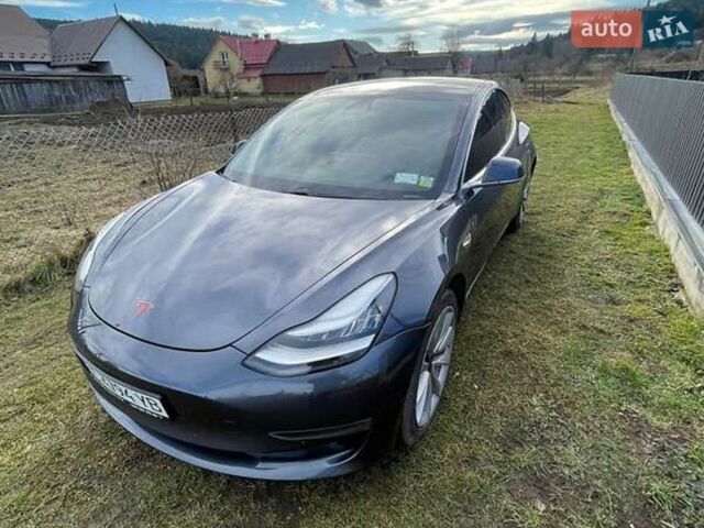 Серый Тесла Модель 3, объемом двигателя 0 л и пробегом 129 тыс. км за 20900 $, фото 3 на Automoto.ua