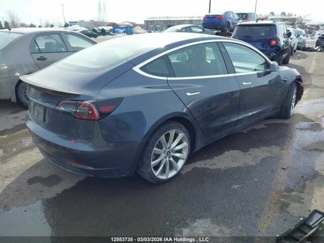 Серый Тесла Модель 3, объемом двигателя 0 л и пробегом 129 тыс. км за 9500 $, фото 3 на Automoto.ua