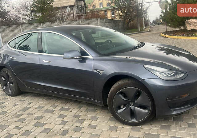 Серый Тесла Модель 3, объемом двигателя 0 л и пробегом 125 тыс. км за 18000 $, фото 1 на Automoto.ua