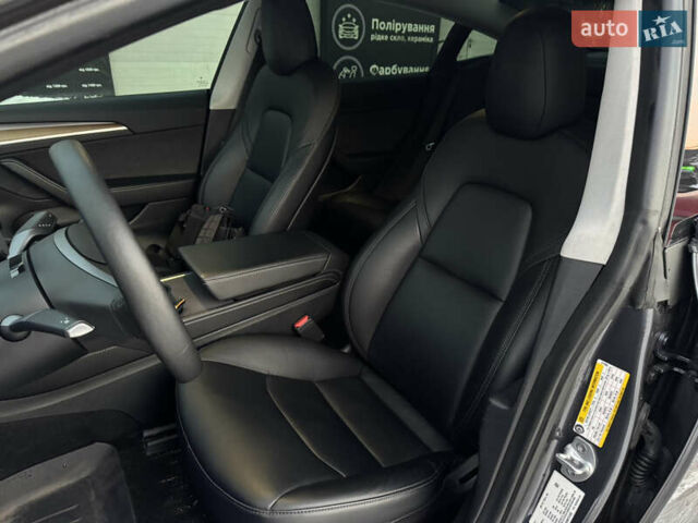 Серый Тесла Модель 3, объемом двигателя 0 л и пробегом 59 тыс. км за 23500 $, фото 26 на Automoto.ua