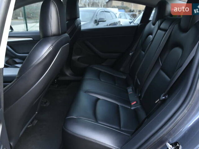 Серый Тесла Модель 3, объемом двигателя 0 л и пробегом 84 тыс. км за 22500 $, фото 27 на Automoto.ua