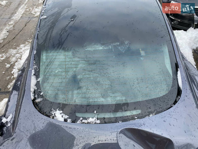 Серый Тесла Модель 3, объемом двигателя 0 л и пробегом 52 тыс. км за 10500 $, фото 2 на Automoto.ua