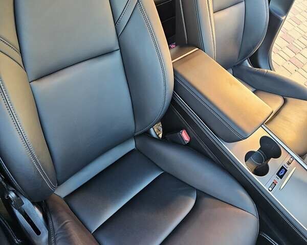 Серый Тесла Модель 3, объемом двигателя 0 л и пробегом 69 тыс. км за 25500 $, фото 4 на Automoto.ua