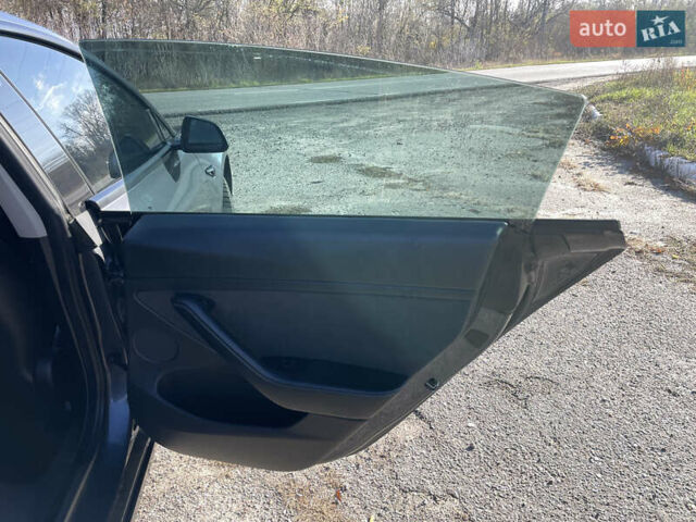 Серый Тесла Модель 3, объемом двигателя 0 л и пробегом 119 тыс. км за 20900 $, фото 9 на Automoto.ua