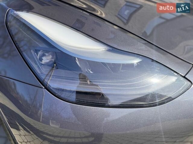 Серый Тесла Модель 3, объемом двигателя 0 л и пробегом 80 тыс. км за 23700 $, фото 12 на Automoto.ua