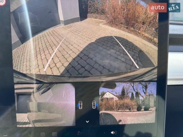 Серый Тесла Модель 3, объемом двигателя 0 л и пробегом 80 тыс. км за 23700 $, фото 27 на Automoto.ua