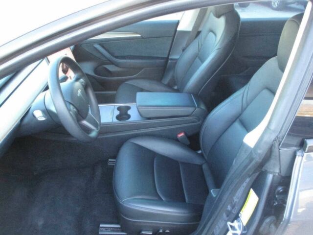 Серый Тесла Модель 3, объемом двигателя 0 л и пробегом 21 тыс. км за 10600 $, фото 7 на Automoto.ua