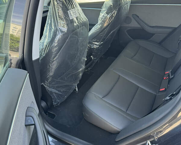 Серый Тесла Модель 3, объемом двигателя 0 л и пробегом 800 тыс. км за 25500 $, фото 6 на Automoto.ua