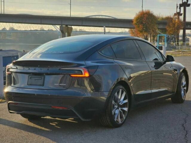 Серый Тесла Модель 3, объемом двигателя 0 л и пробегом 1 тыс. км за 13000 $, фото 3 на Automoto.ua