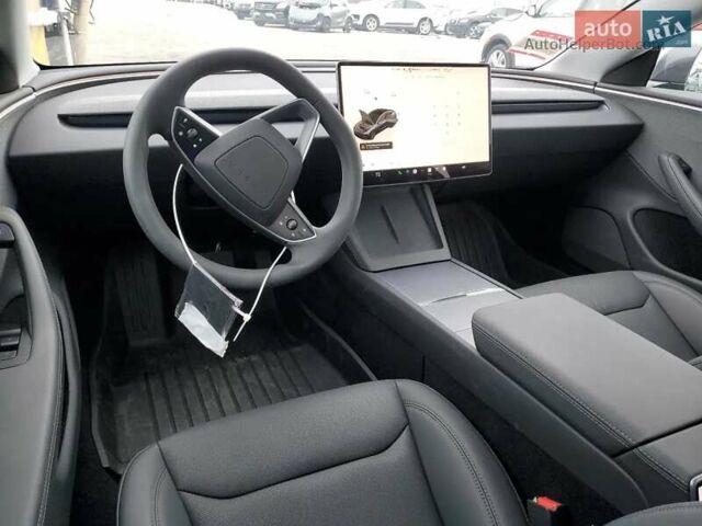 Серый Тесла Модель 3, объемом двигателя 0 л и пробегом 4 тыс. км за 23700 $, фото 2 на Automoto.ua