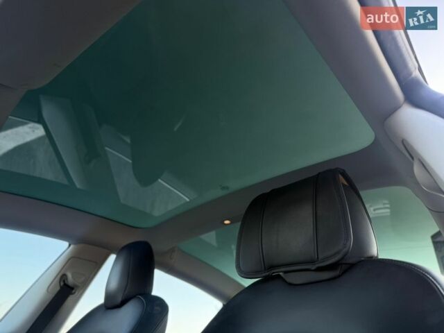 Синій Тесла Модель 3, об'ємом двигуна 0 л та пробігом 180 тис. км за 16999 $, фото 24 на Automoto.ua