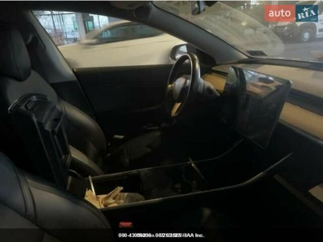 Синий Тесла Модель 3, объемом двигателя 0 л и пробегом 102 тыс. км за 12900 $, фото 5 на Automoto.ua